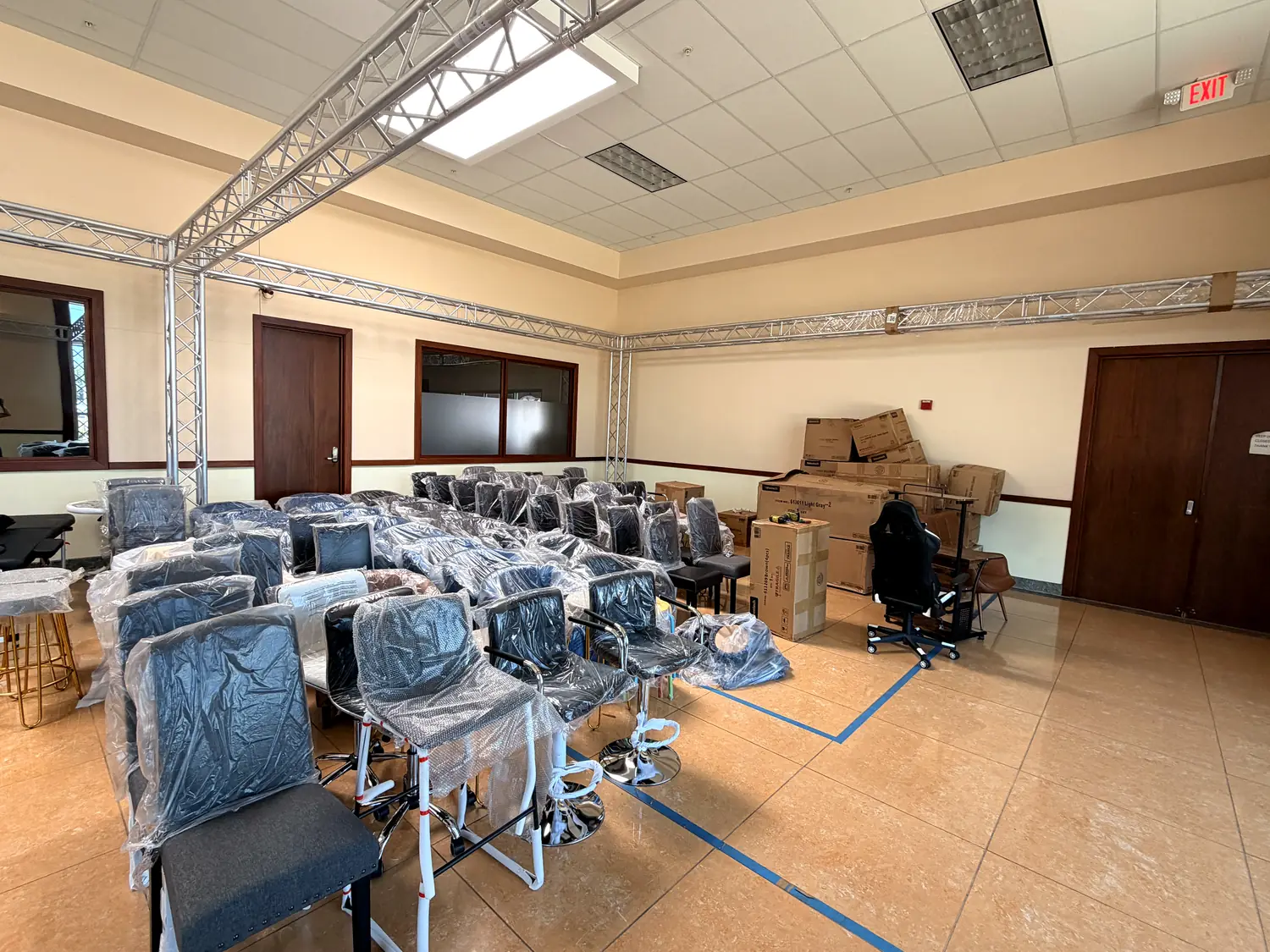 Rows of office chairs staged for the pop-up sale