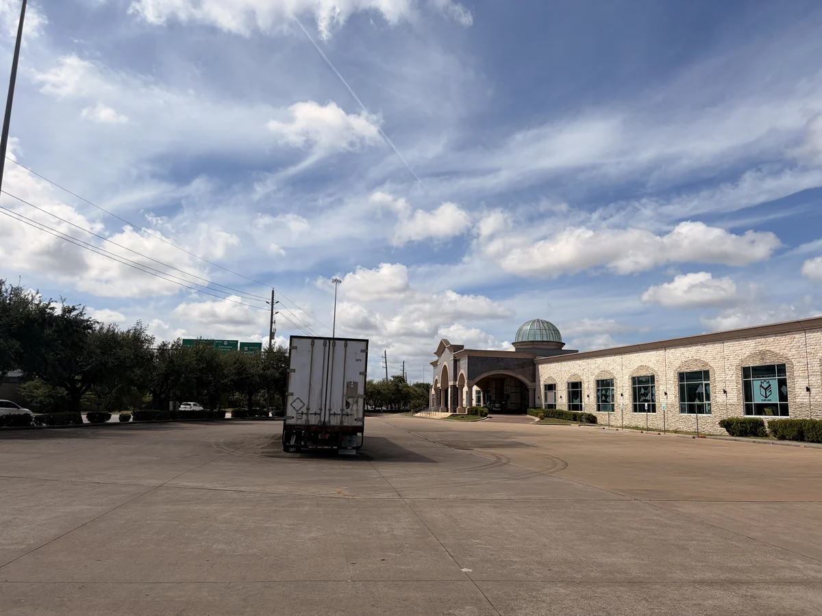 The free parking lot in front of the Cube-Age building in Houston