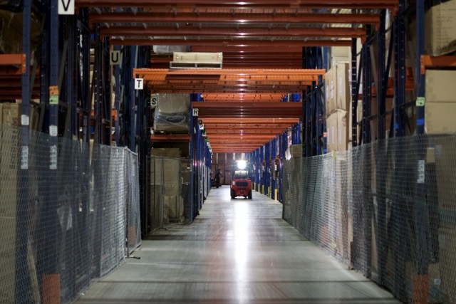 Cube-Age Houston warehouse interior — pallet racking with alphabetized aisles