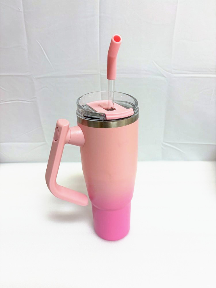 Stainless steel tumbler with handle, peach-pink fade