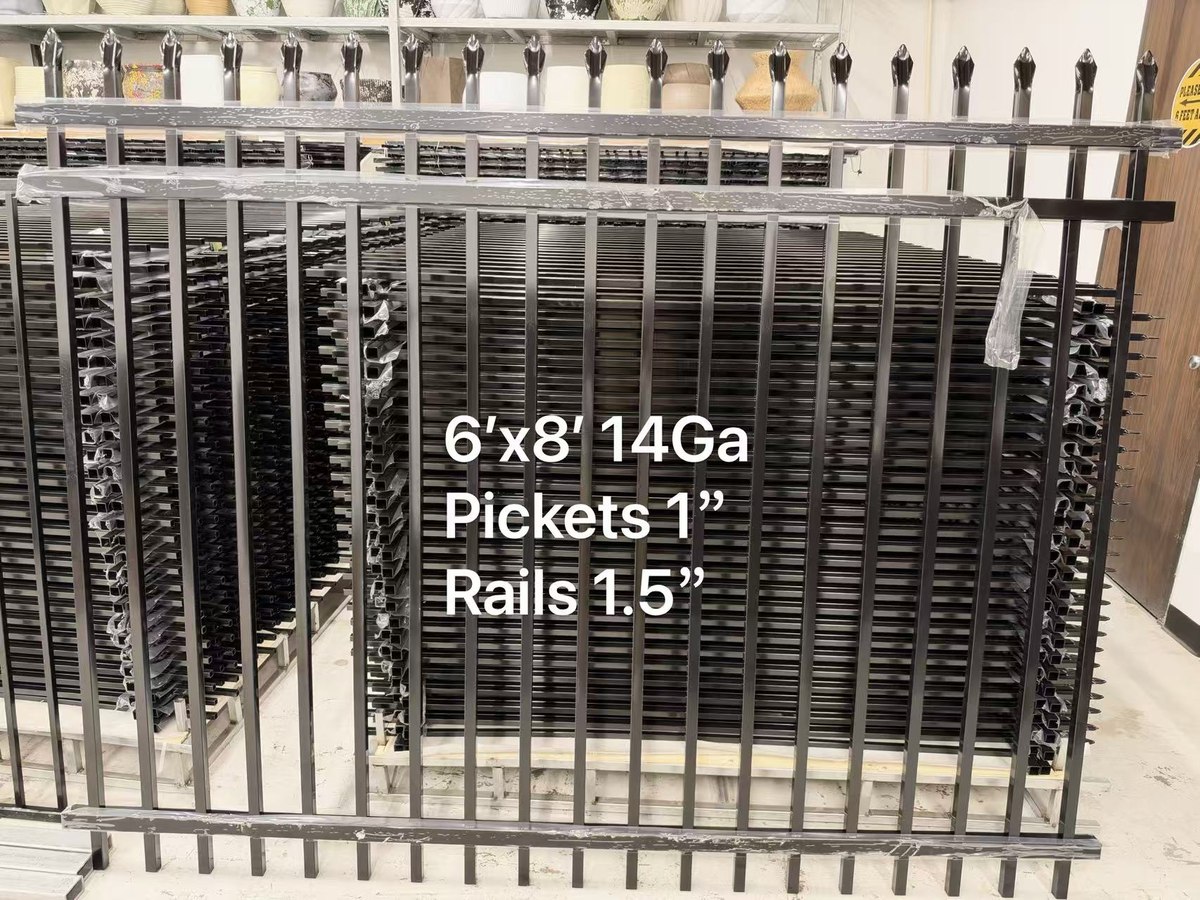 Stacks of 6 by 8 foot 14 gauge steel fence panels in the Cube-Age Houston warehouse