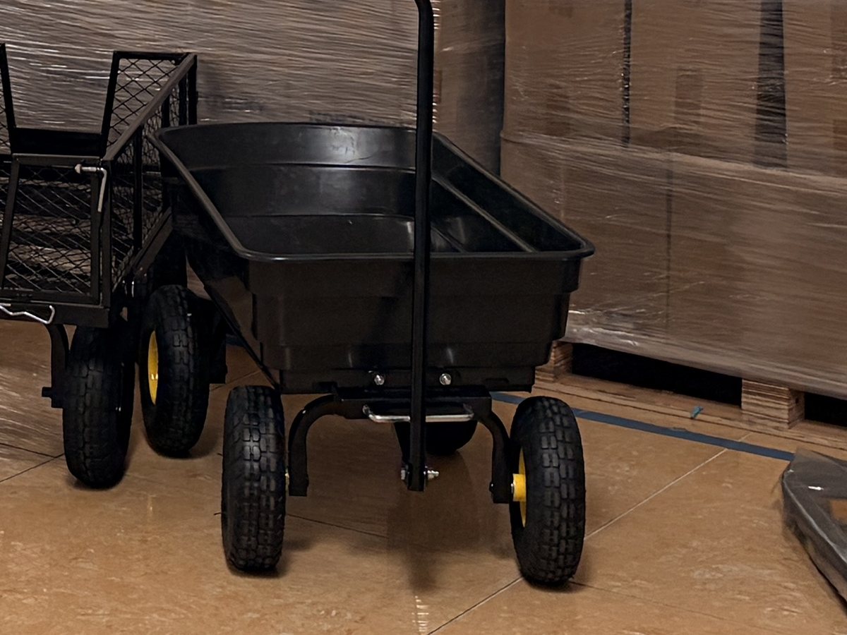 The poly-bed dump cart standing on our Houston warehouse floor