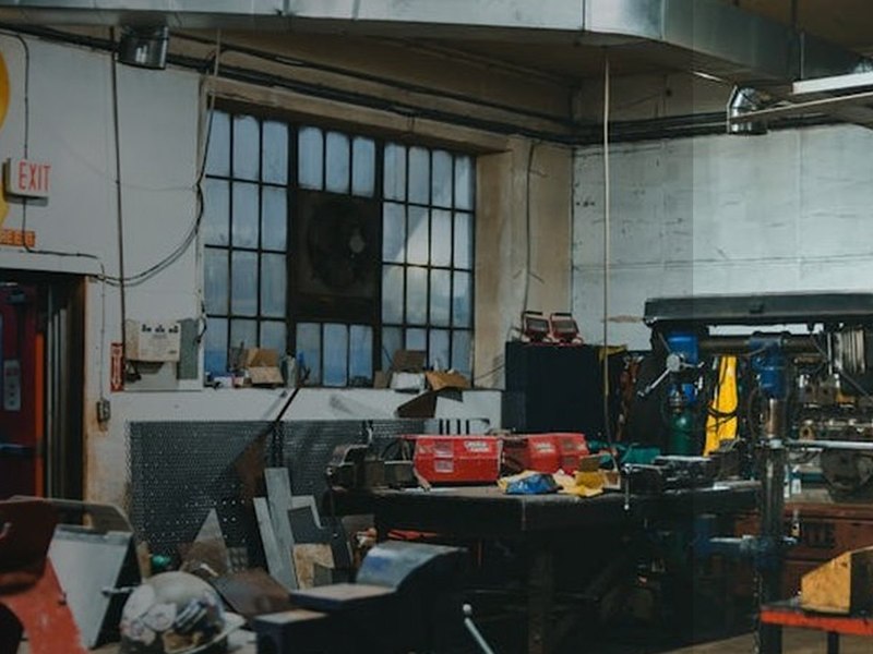 A workshop bench with tool storage in a garage