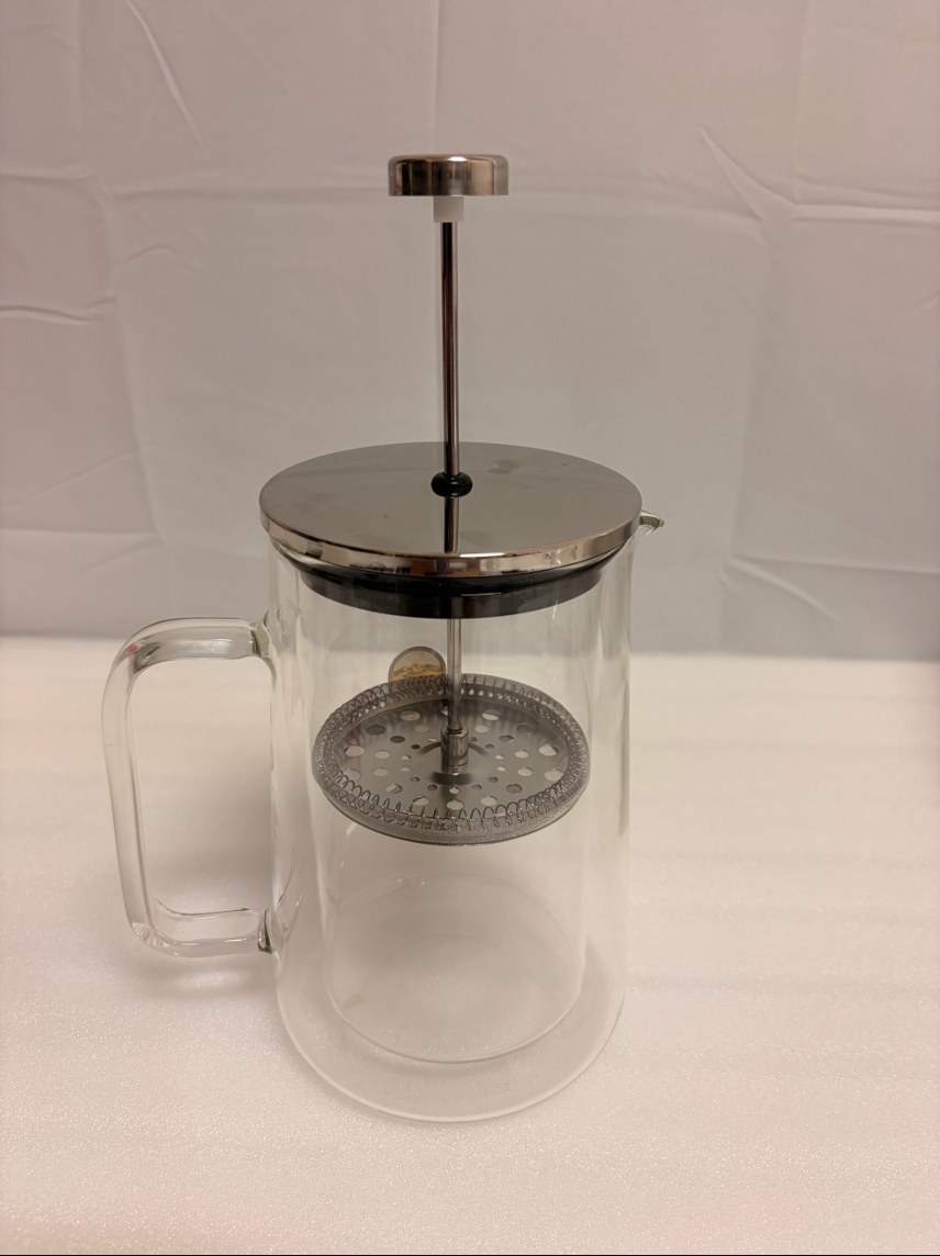 A large double-wall glass pot with a plunger and a mesh filter