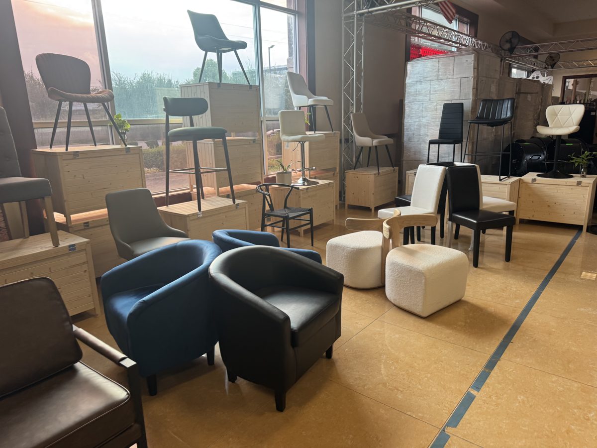 Armchairs, dining chairs and bar stools on the warehouse floor