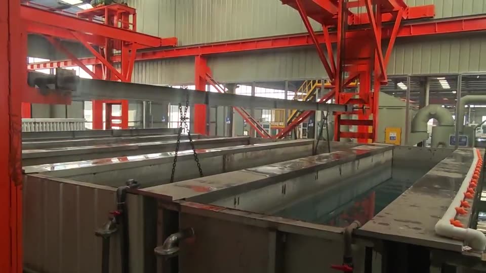 Welded steel panels lowered into the pre-treatment tanks